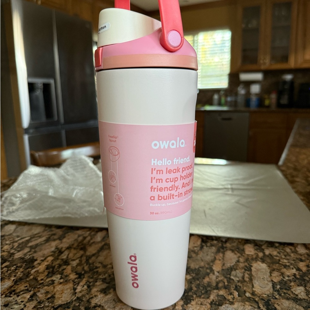 Owala 30oz Insulated Water Bottle in White and Pink